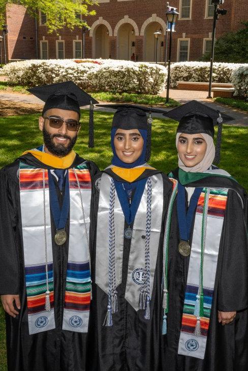 Alkaifi Siblings in caps and gowns